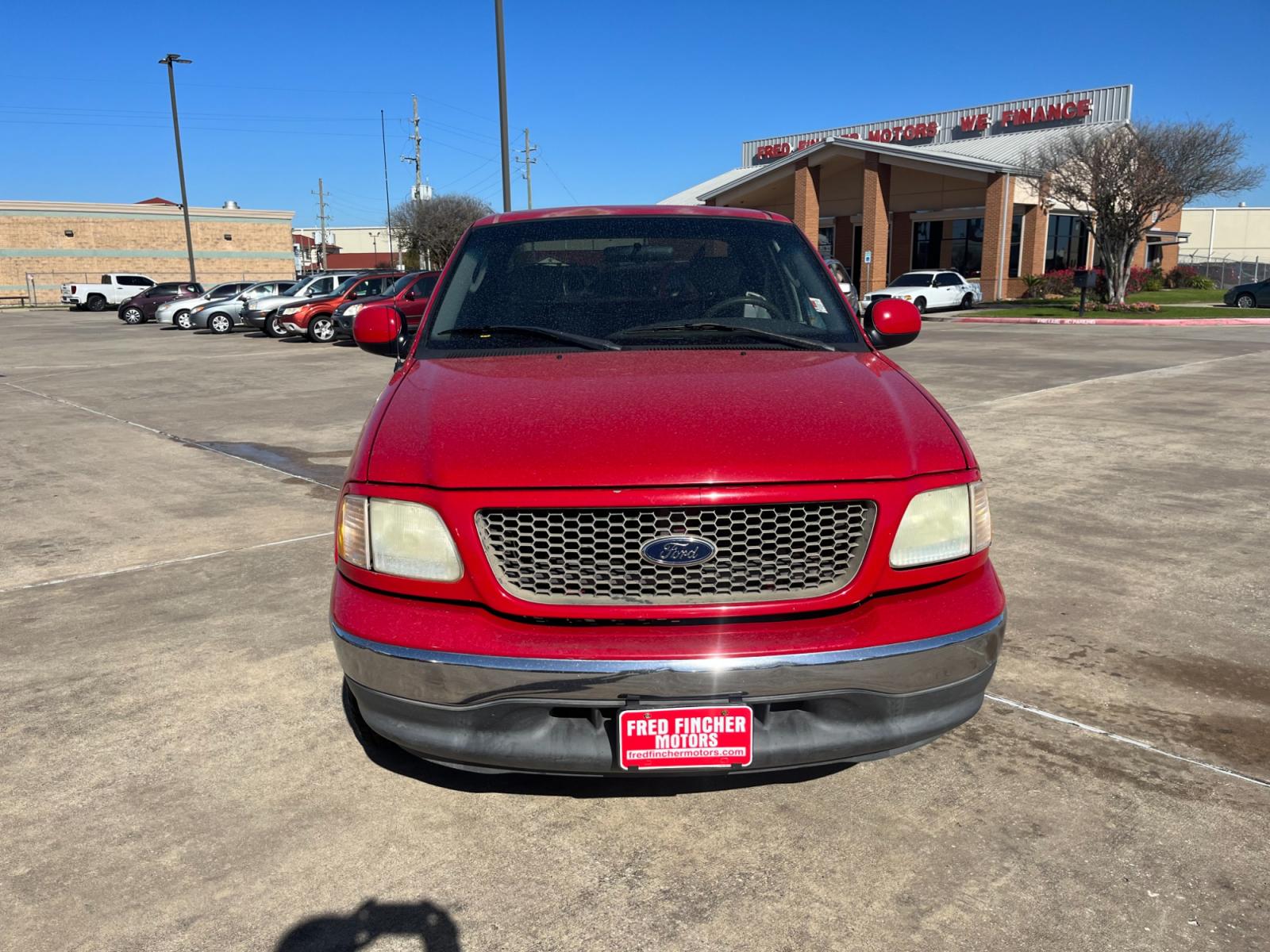 2003 red /TAN Ford F-150 XL SuperCab Flareside 2WD (1FTRX07213K) with an 4.2L V6 OHV 12V engine, Automatic transmission, located at 14700 Tomball Parkway 249, Houston, TX, 77086, (281) 444-2200, 29.928619, -95.504074 - Photo #1
